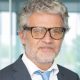 portrait-grey-haired-businessman-standing_74855-10324